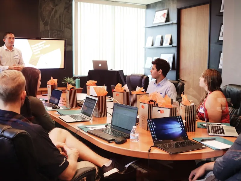 People collaborating around a meeting table