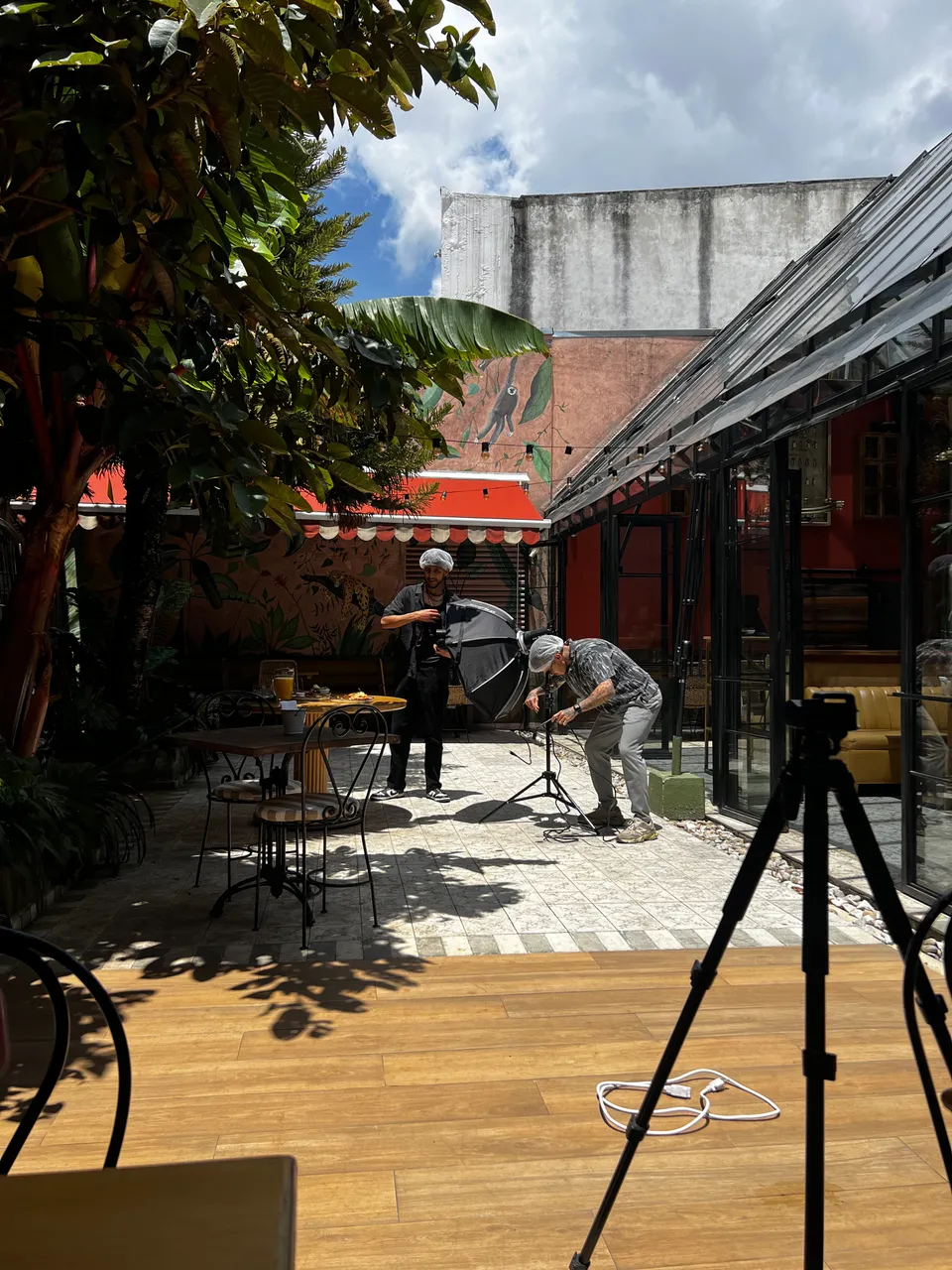 Creative team photographing a restaurant dish on location
